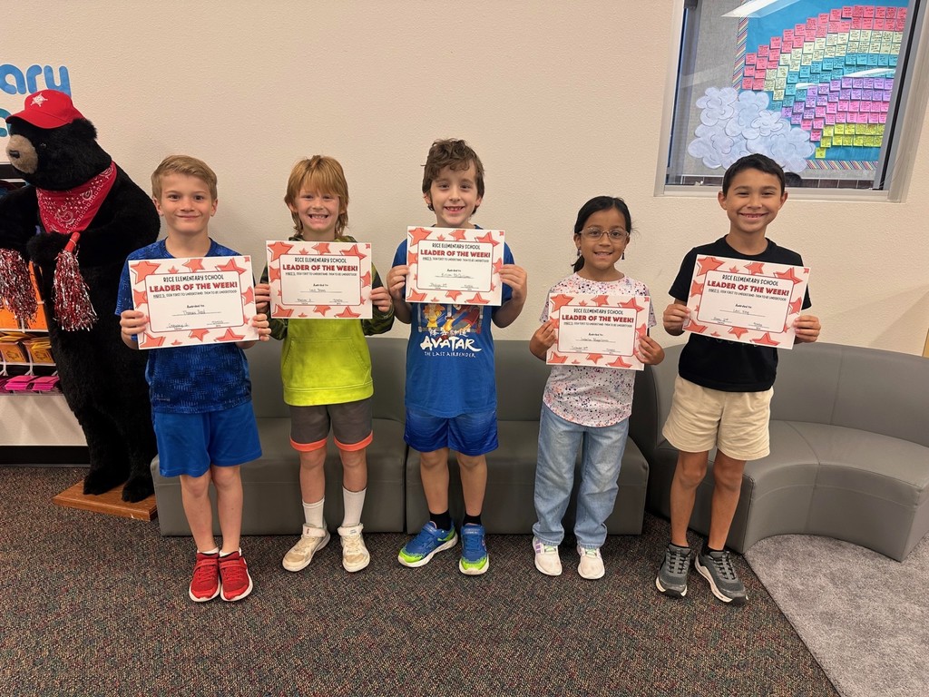 students holding certificates
