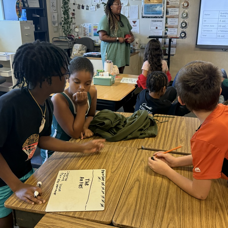 students playing a basketball review game in science class