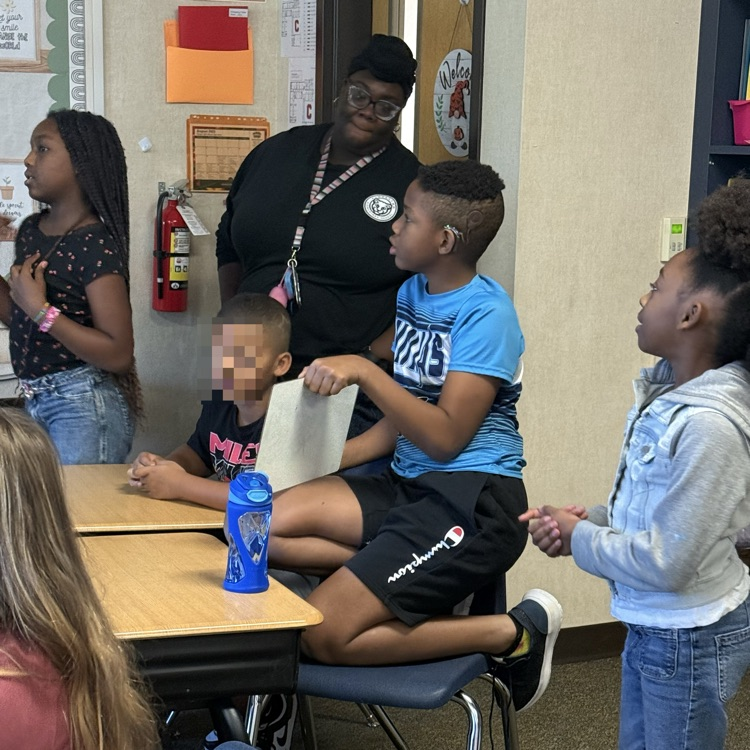 students playing a basketball review game in science class