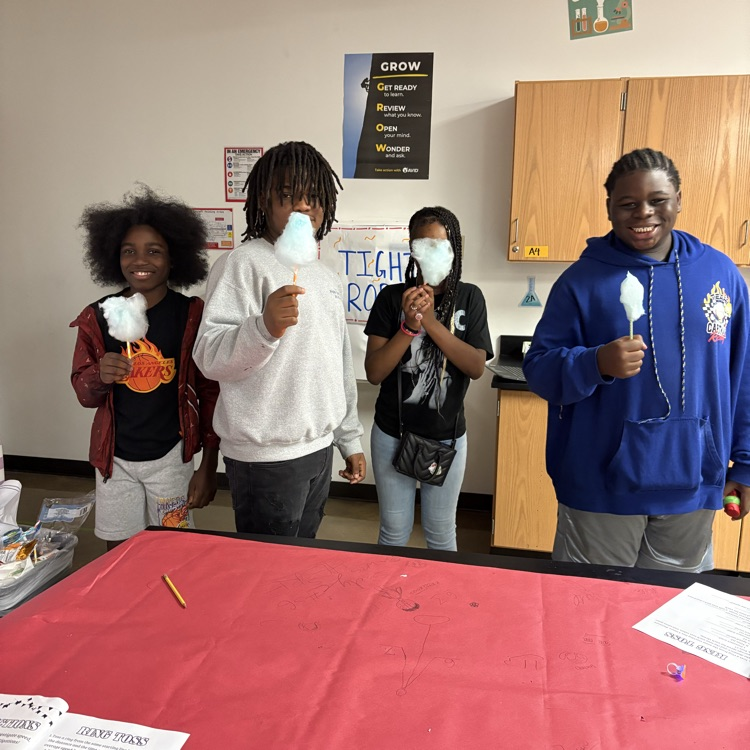 student playing carnival game 