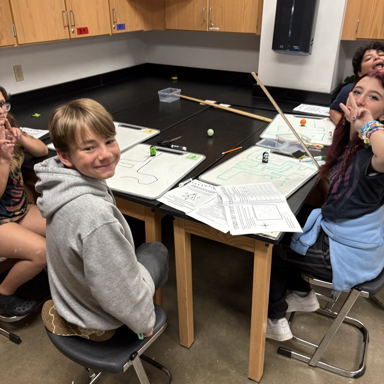 student playing carnival game 