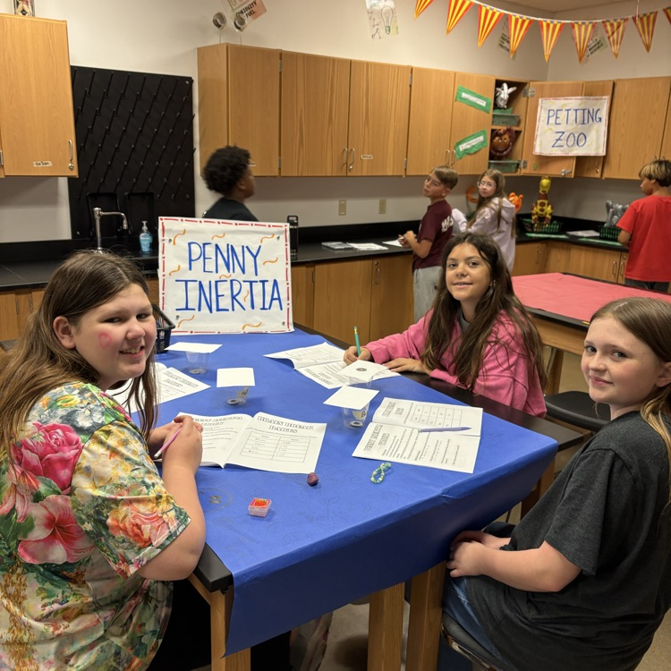 student playing carnival game 