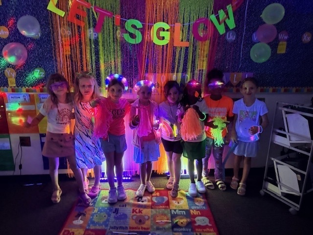 Students in glow day apparel