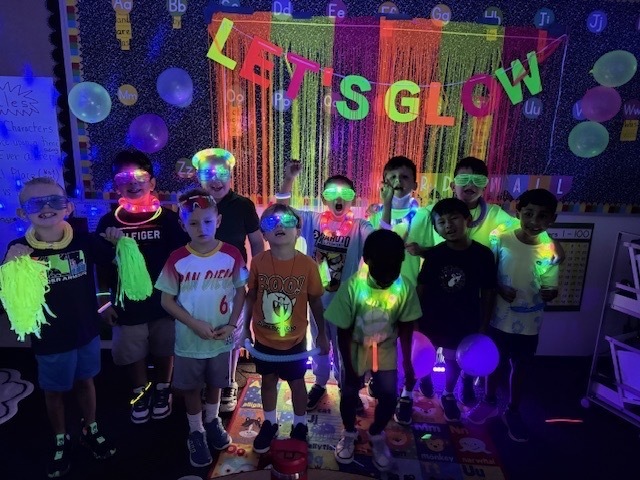 Students in glow day apparel