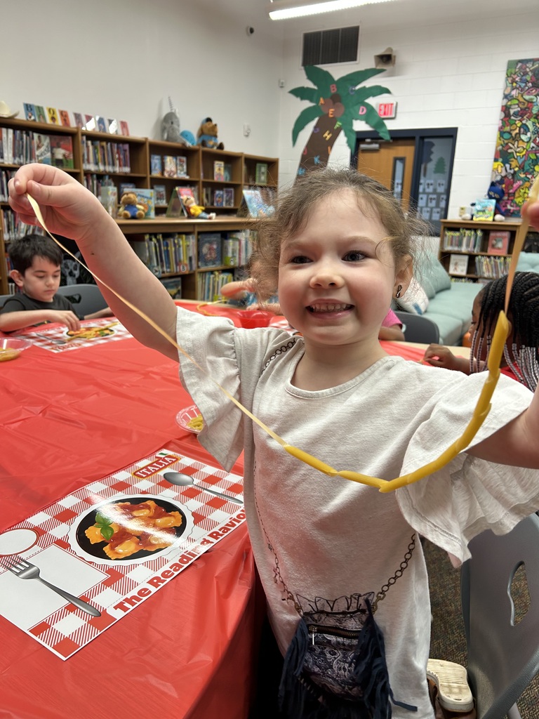 Students ready books for genre tasting.