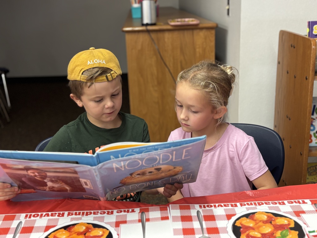 Students ready books for genre tasting.