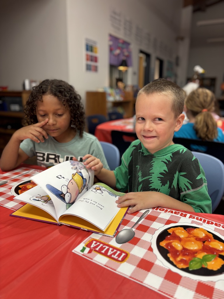 Students ready books for genre tasting.