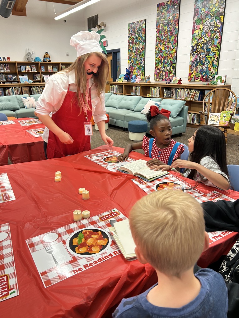 Students ready books for genre tasting.