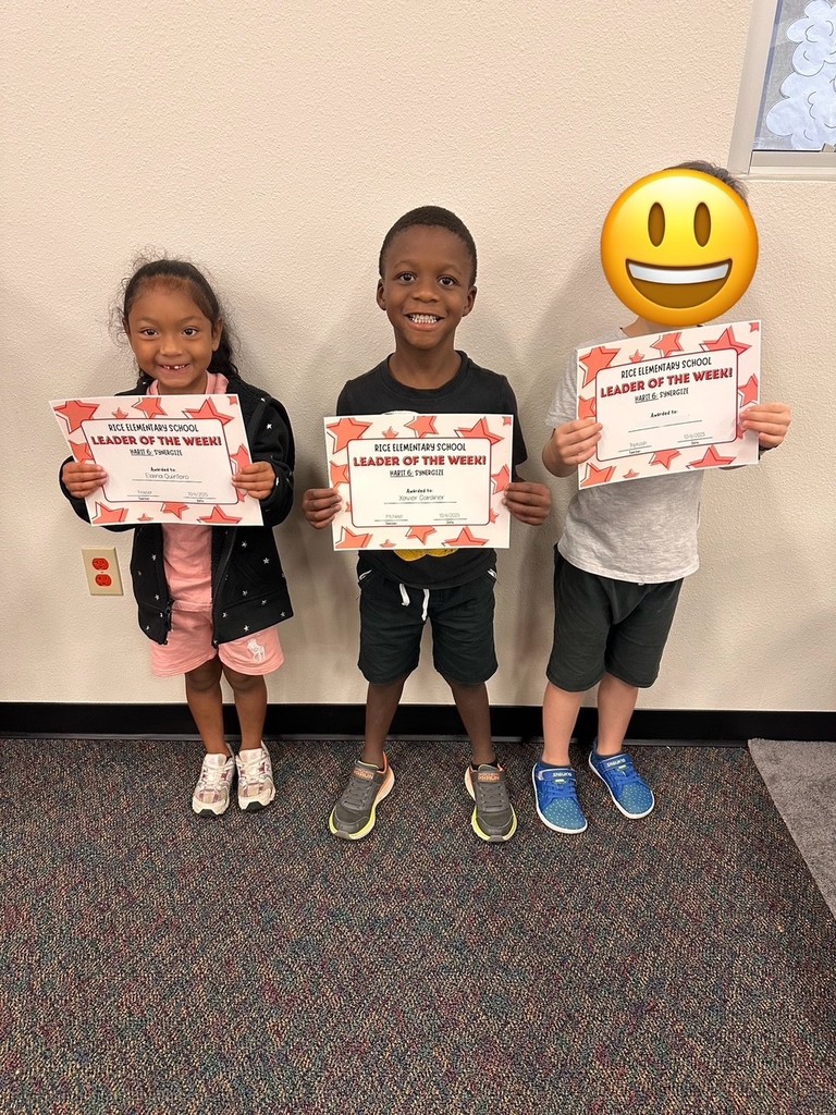 students holding certificates