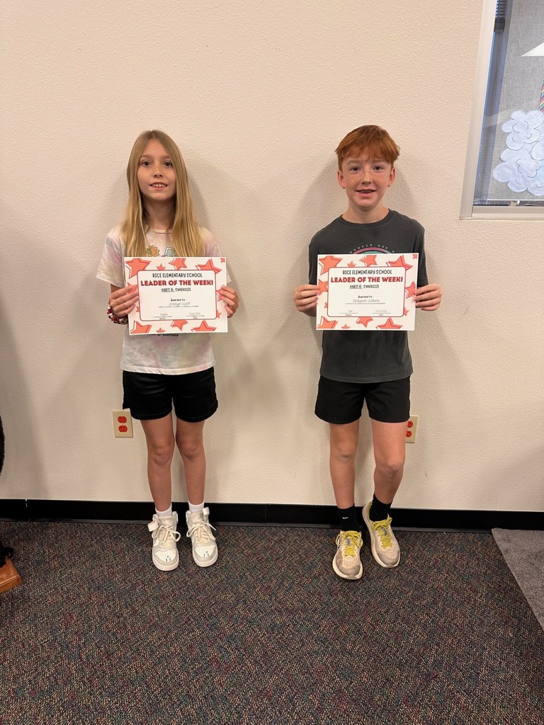 students holding certificates