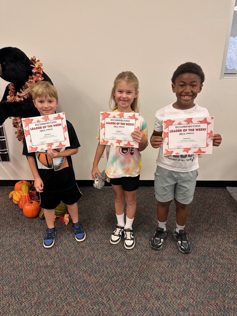 students holding certificates