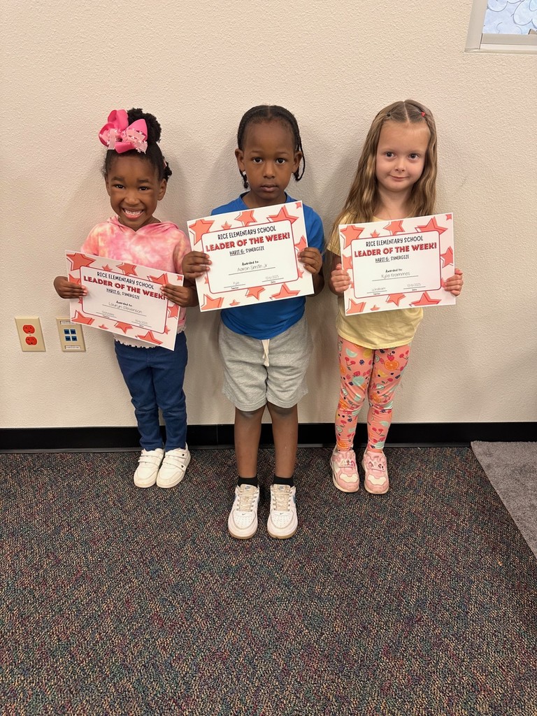 students holding certificates
