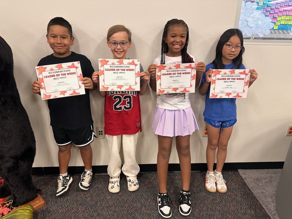 students holding certificates