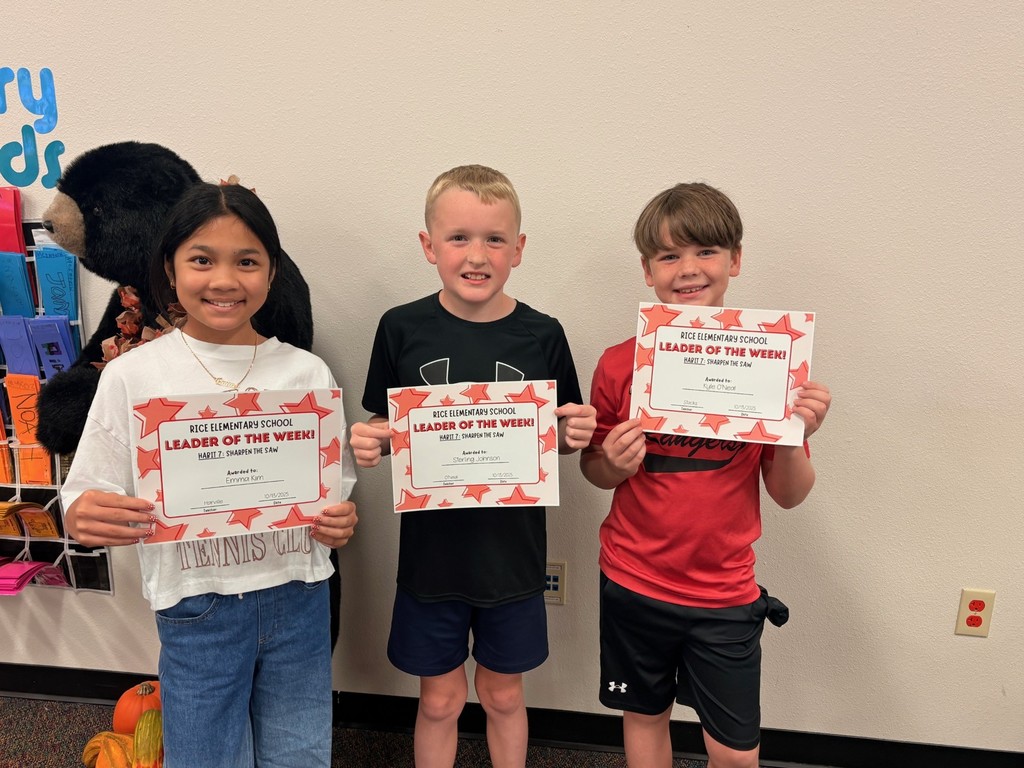 students holding certificates