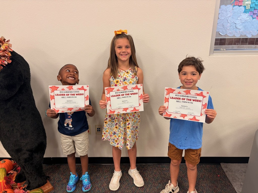 students holding certificates