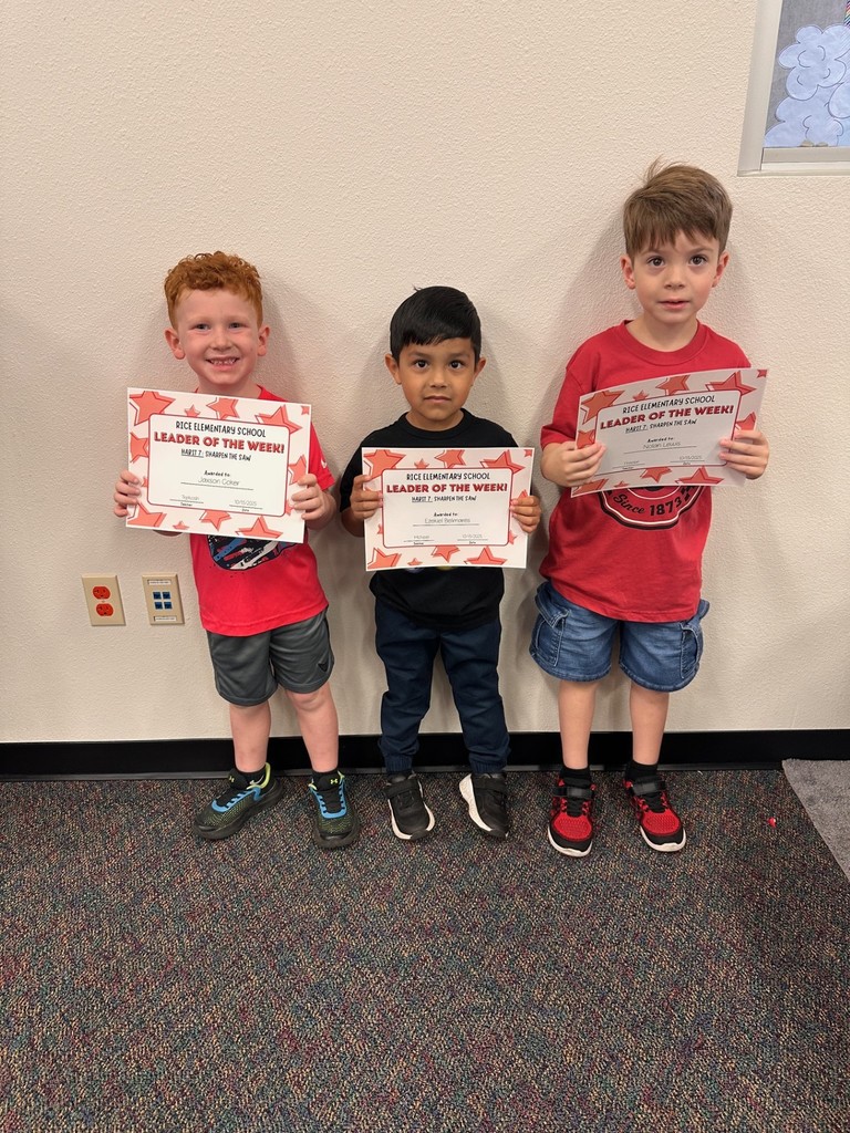 students holding certificates