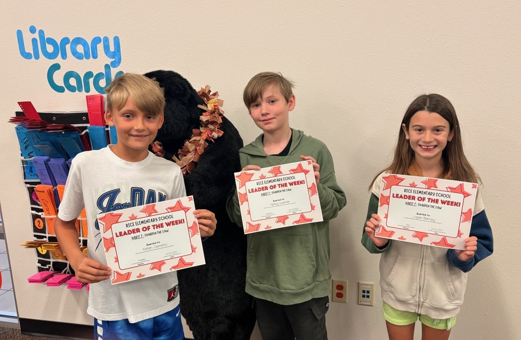 students holding certificates