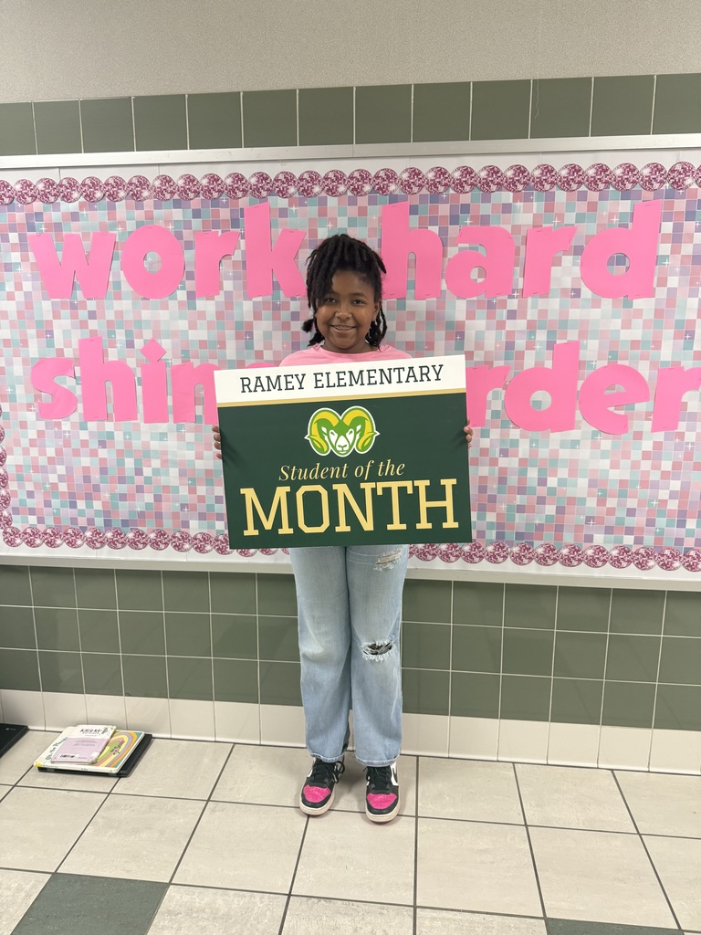 Little girl holding sign