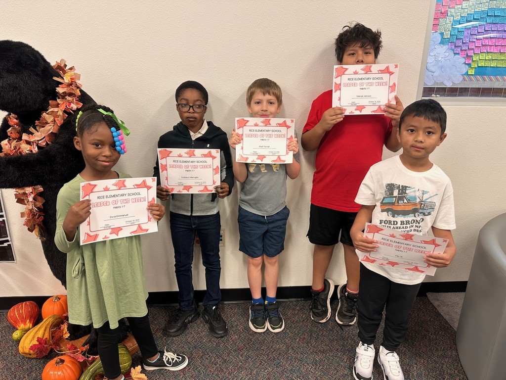 students holding certificates