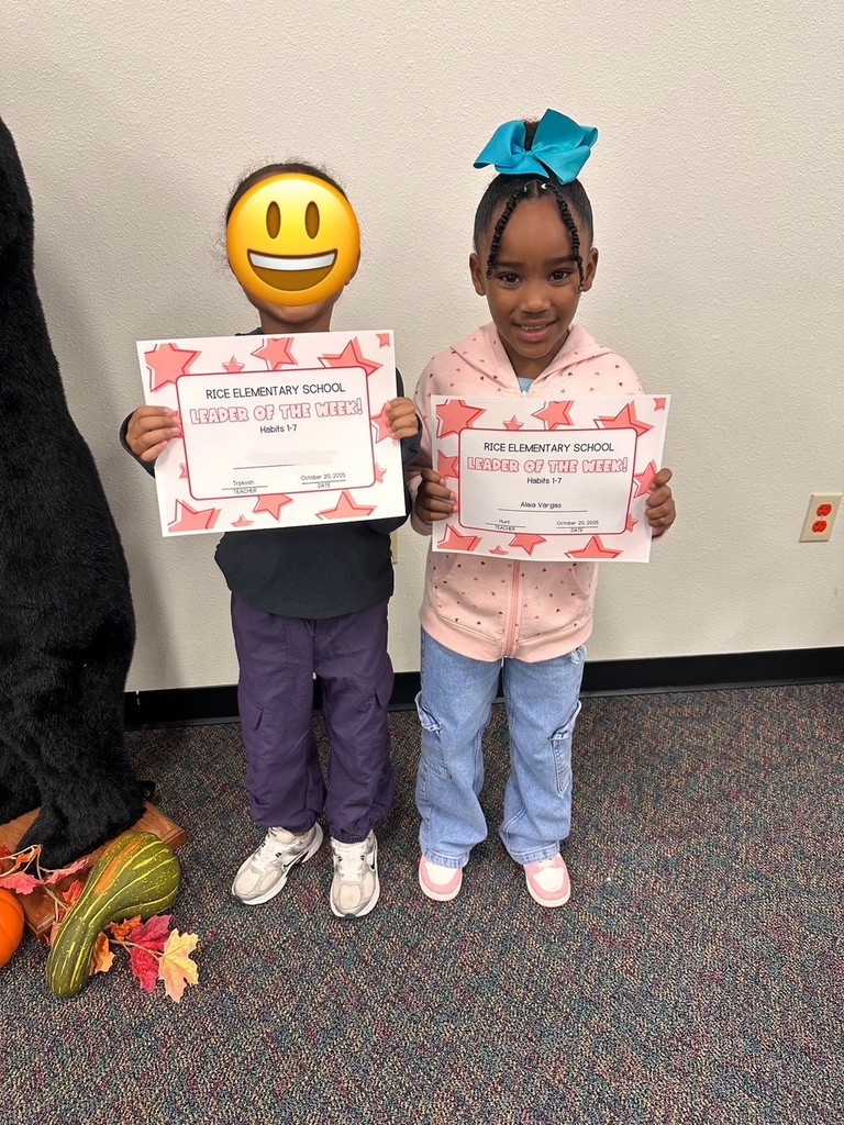 students holding certificates