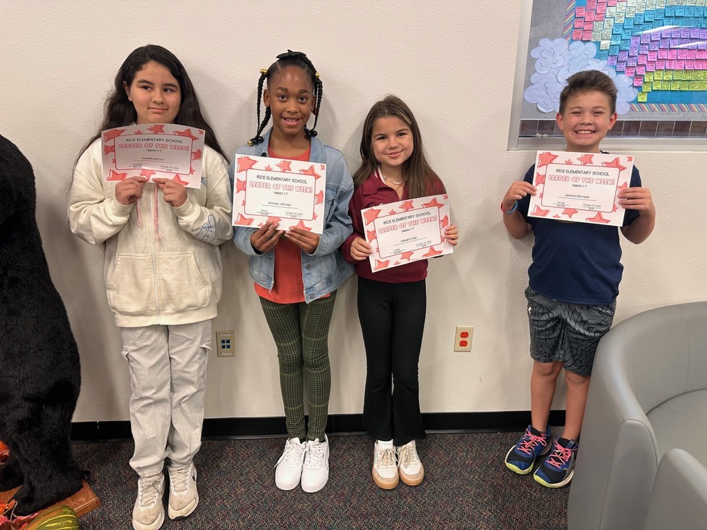 students holding certificates