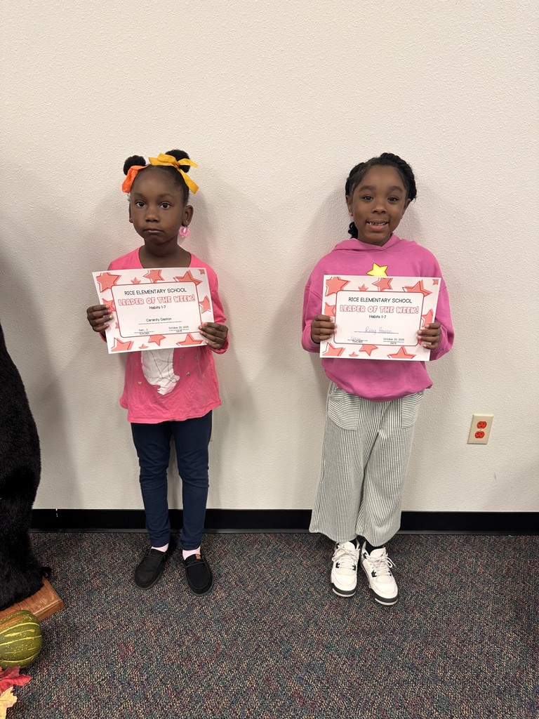 students holding certificates