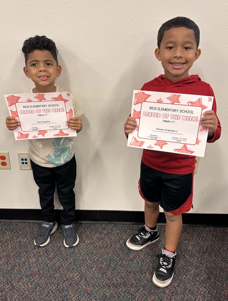 students holding certificates