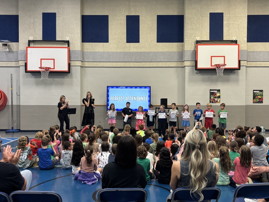 Students receiving awards for attendance