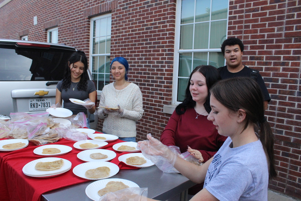 Coach Macias and Mr. McHann's class making fajitas