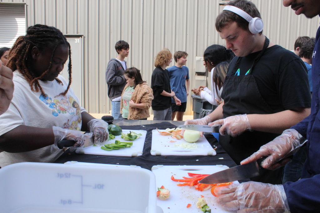 Coach Macias and Mr. McHann's class making fajitas