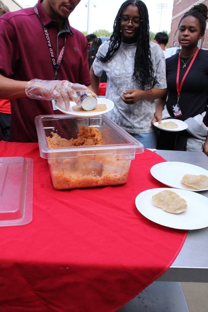 Coach Macias and Mr. McHann's class making fajitas