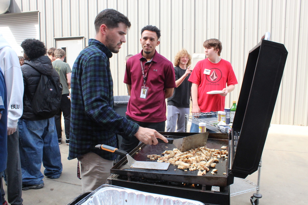 Coach Macias and Mr. McHann's class making fajitas