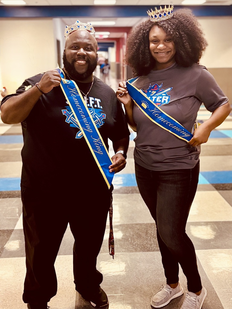 Homecoming queen and king Coach Green and Coach Benson 