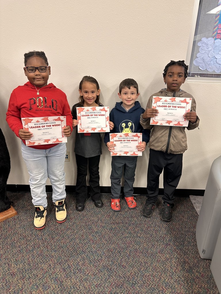students holding certificates