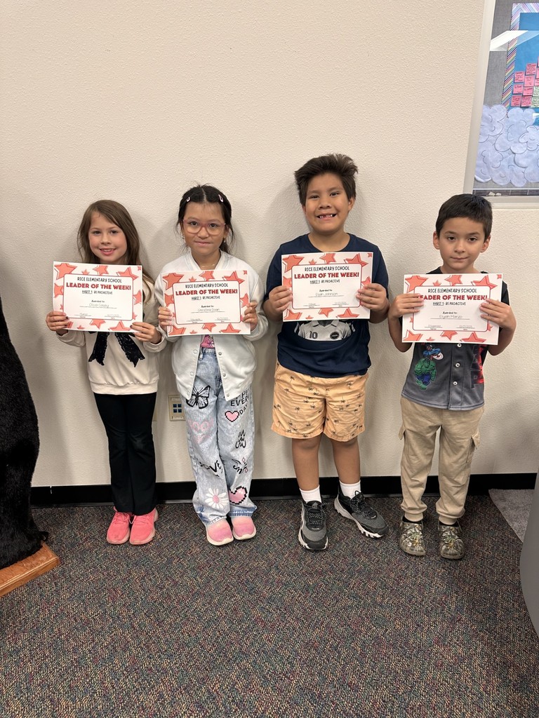 students holding certificates