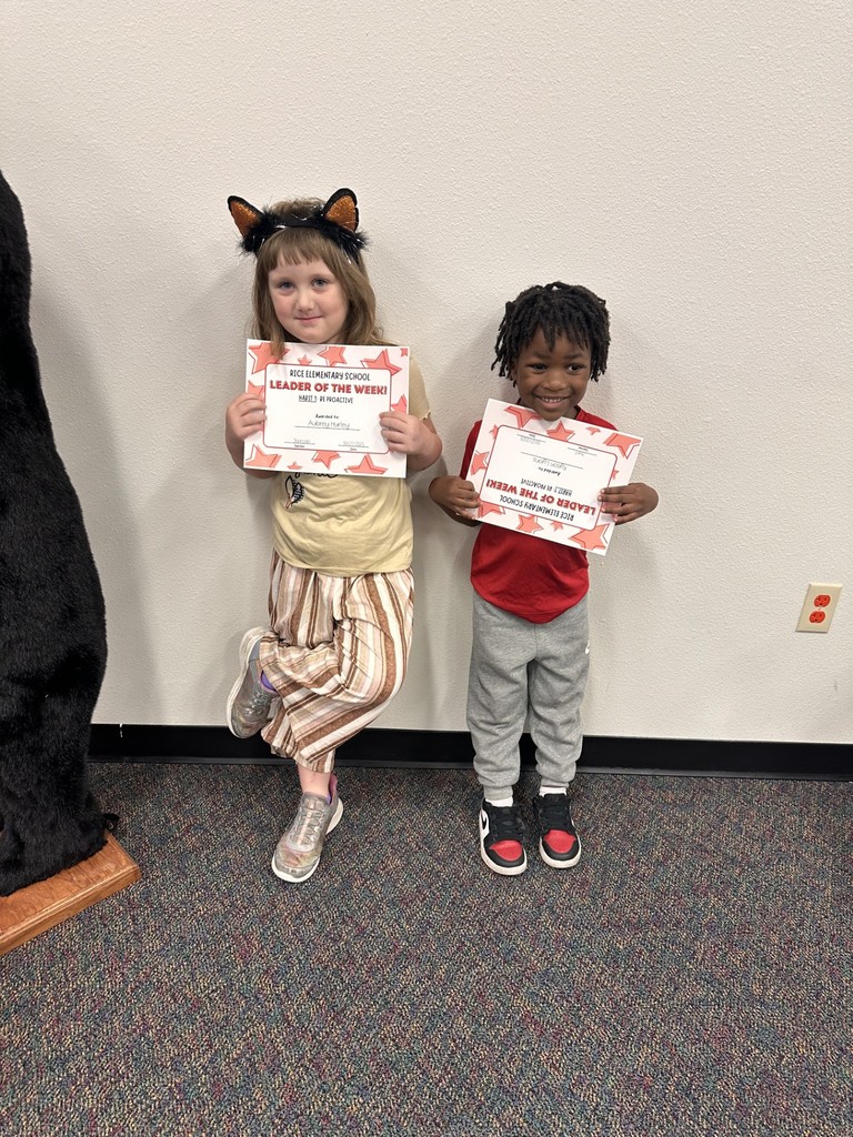 students holding certificates