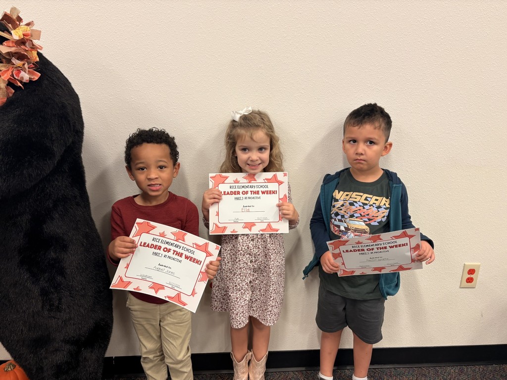 students holding certificates
