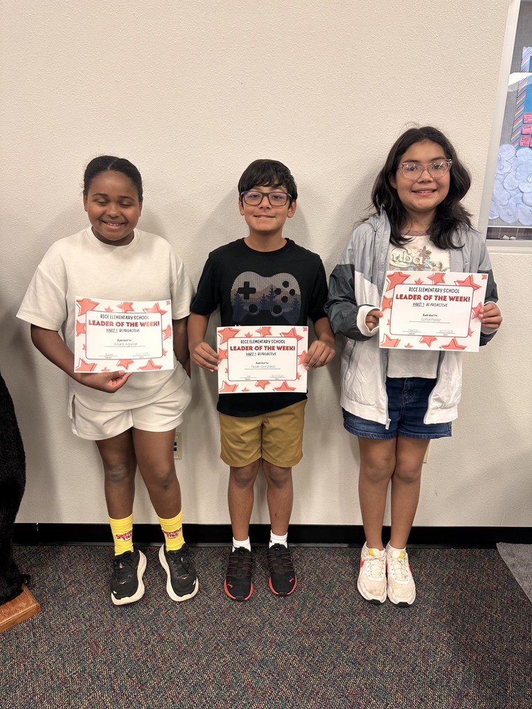 students holding certificates