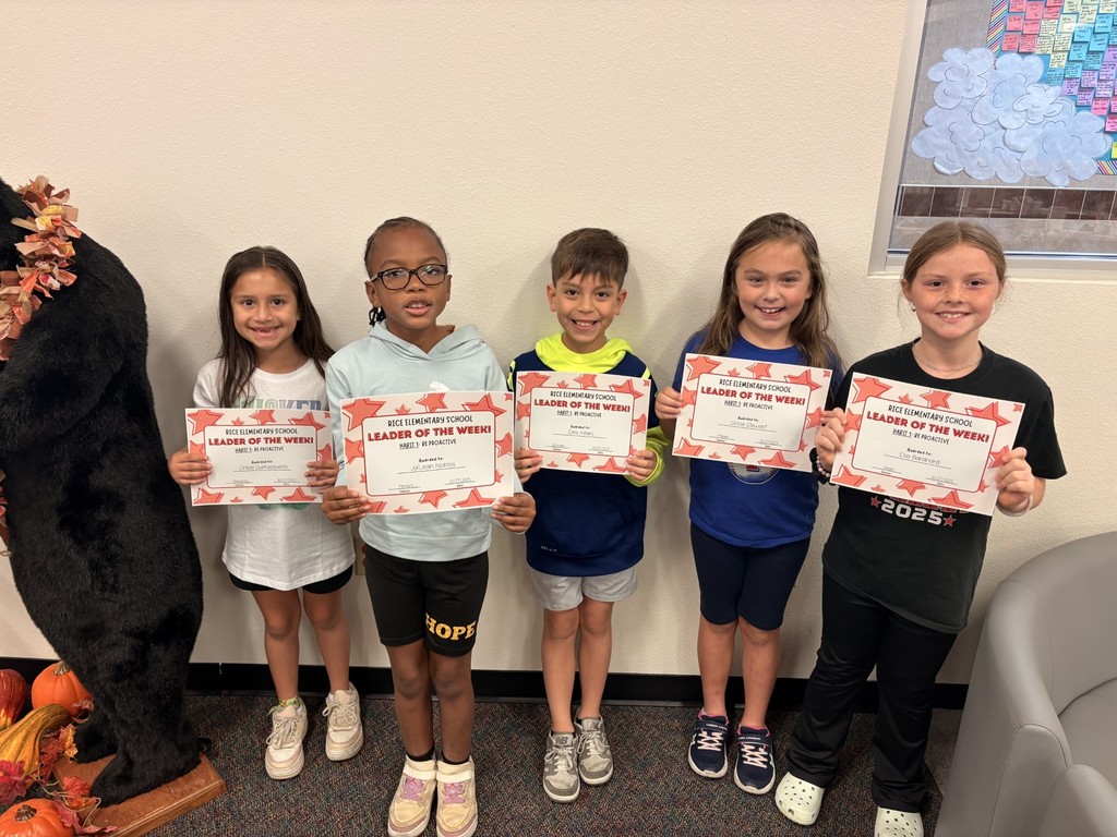 students holding certificates