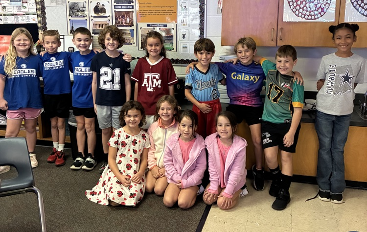 kids wearing jerseys and dressed alike