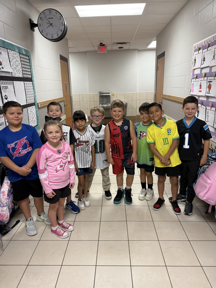 kids wearing jerseys and dressed alike