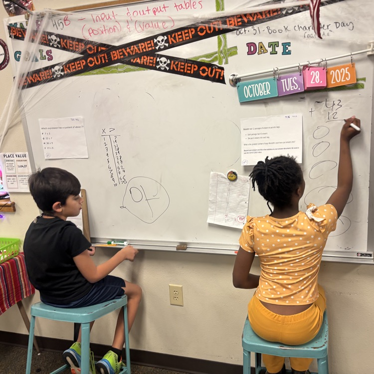 students reviewing math problems for upcoming math test