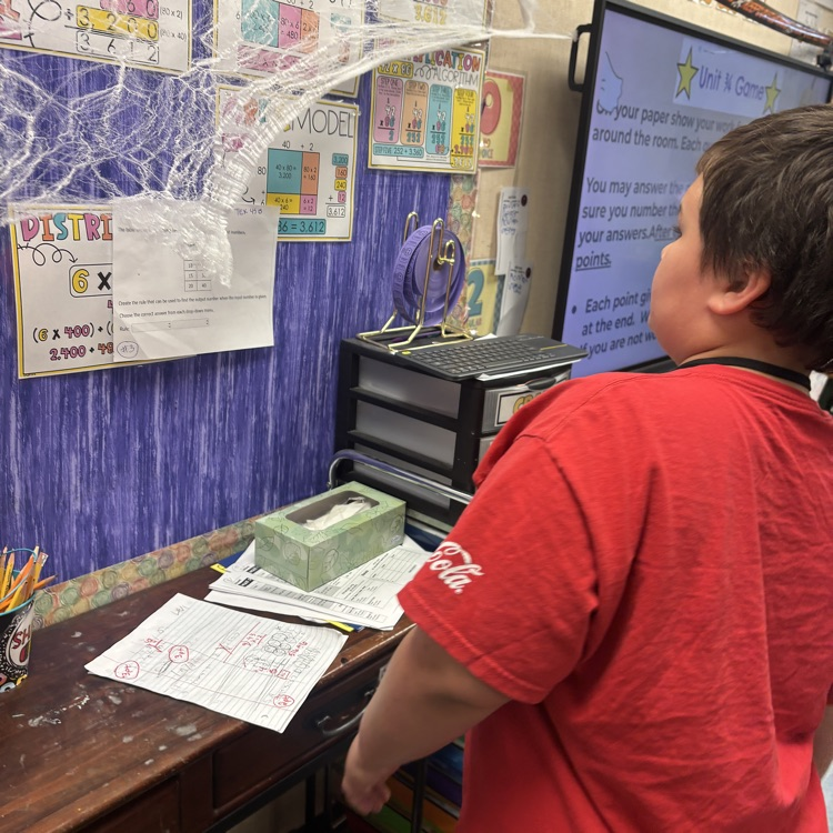 students reviewing math problems for upcoming math test