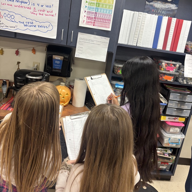 students reviewing math problems for upcoming math test