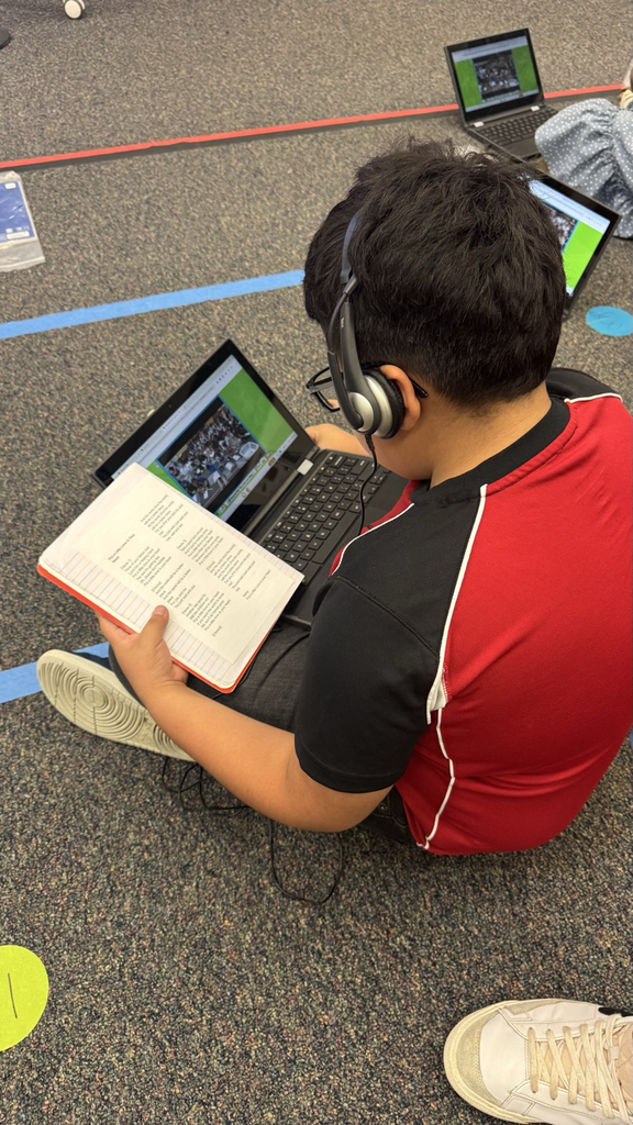 students working with chromebooks