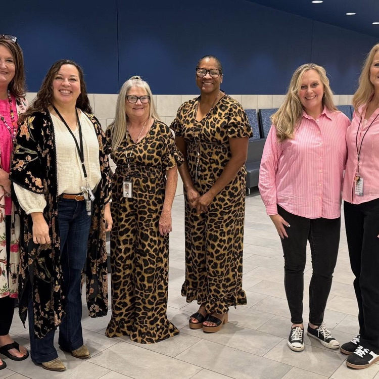 several ladies dressed alike