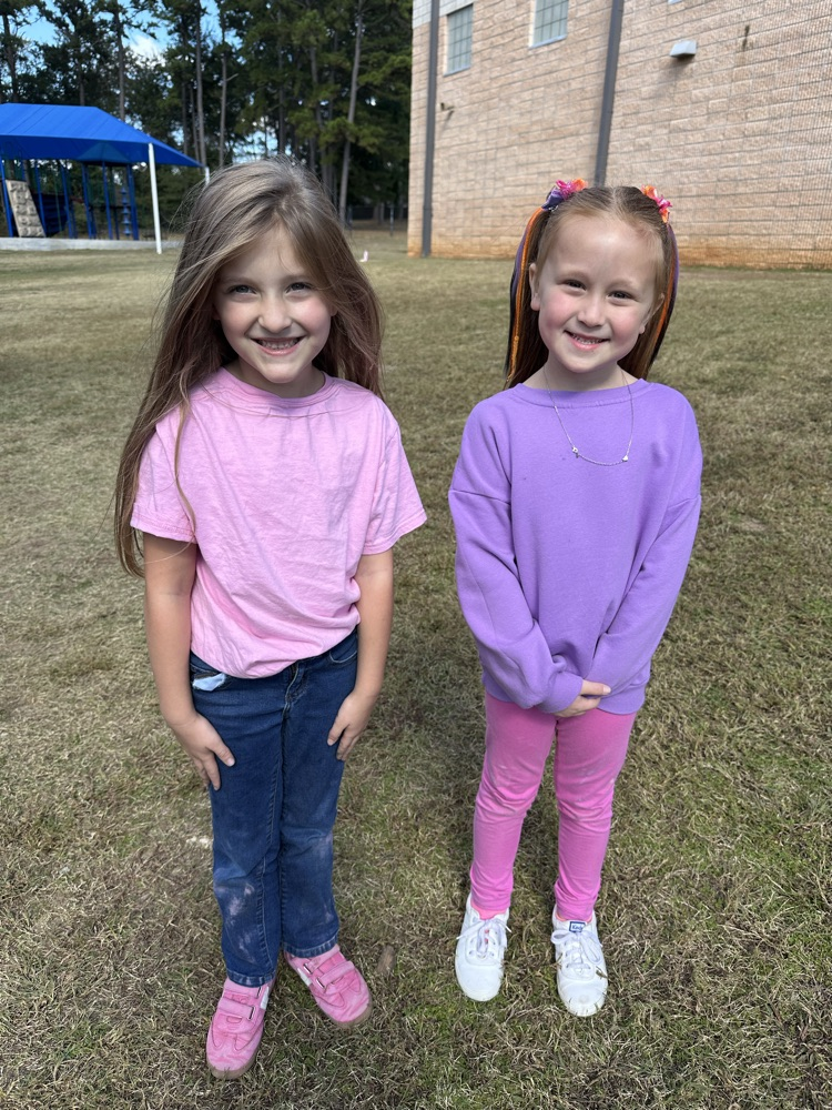1st graders on the playground wearing silly clothing and making silly faces for Wacky Wednesday