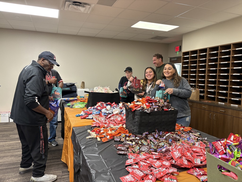 Trick or treating in the mail room at Tyler Legacy