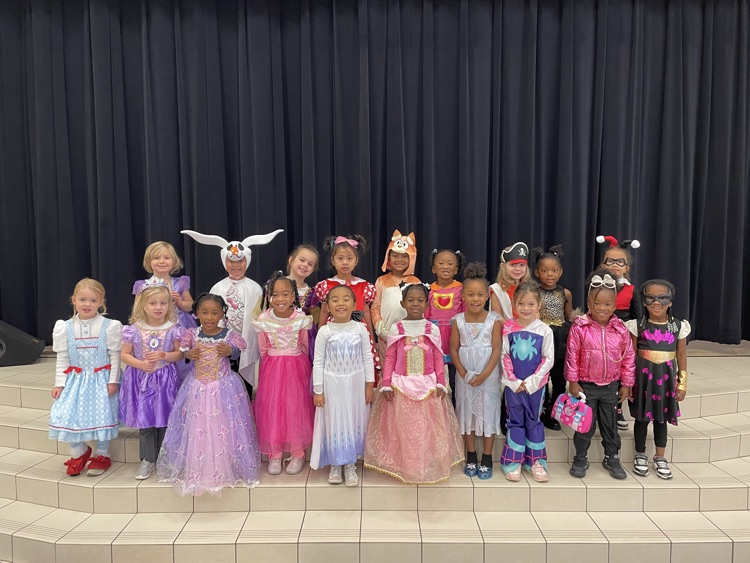 Kids in Halloween costumes.