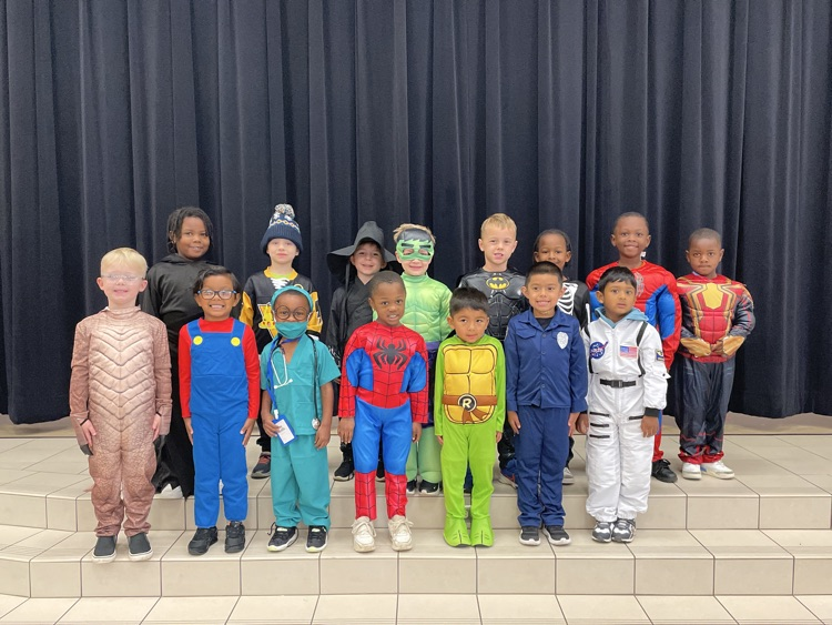 Kids in Halloween costumes.